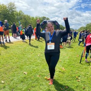 Finish line photo of Despina who ran 5k to raise funds for our charities in the Parallel Windsor Festival on 7 July 2024