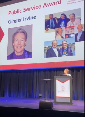 Dr Emilia Gatto's presentation at the Gala, with pictures of Ginger, Glenn and Alexandra Irvine on the big screen in the background