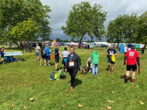 Finish line photo of Despina who ran 5k to raise funds for our charities in the Parallel Windsor Festival on 7 July 2024