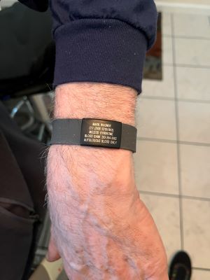 Mark's medical alert bracelet as described in the article