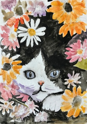 Black & white cat face hiding among colourful flowers
